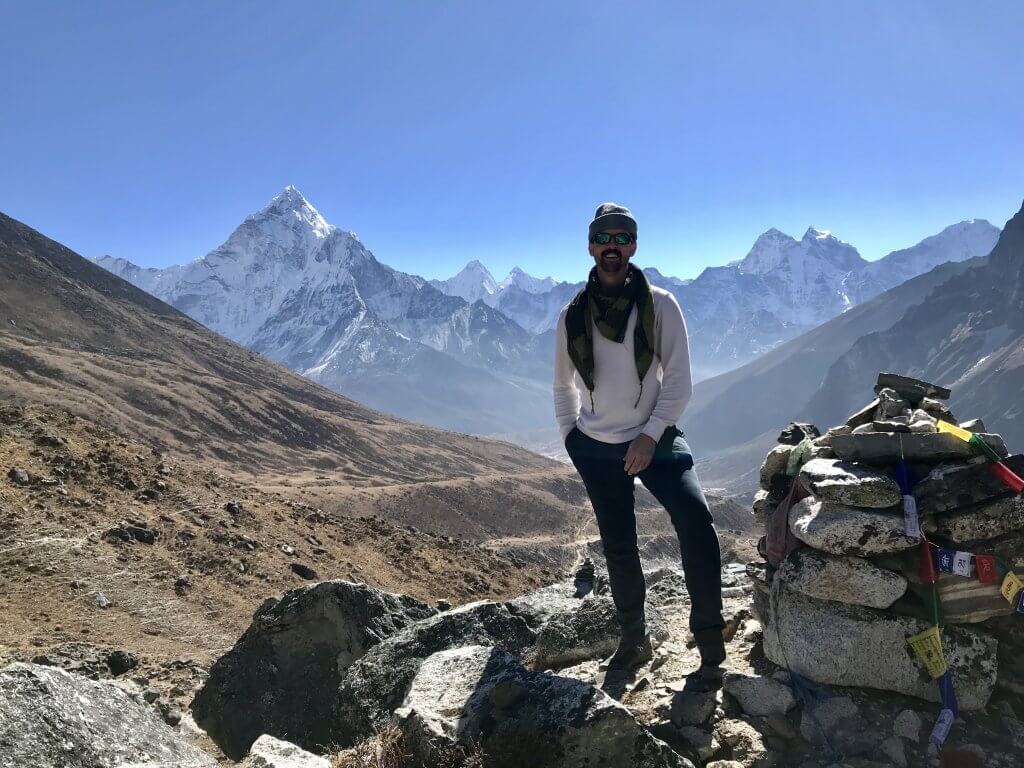 Man at the Mount Everest base camp in the Himalayan Mountains of Nepal, solo travel