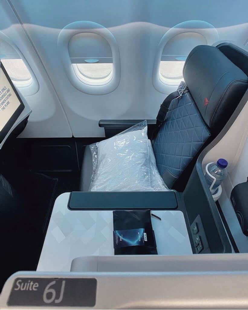 first class seat delta airlines purchase with points to travel free