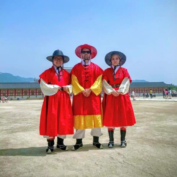 Tourists dressed as palace guards at Gyeongbokgung Palce in Seoul South Korea