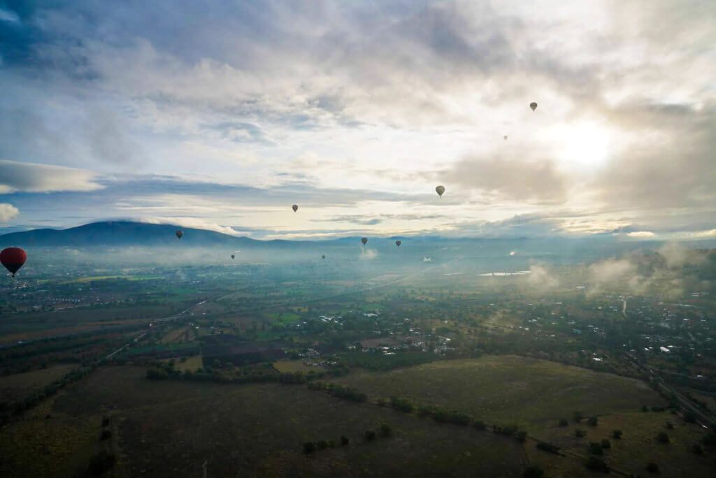 Hot air balloons in sky in Teotihuacan, Mexico